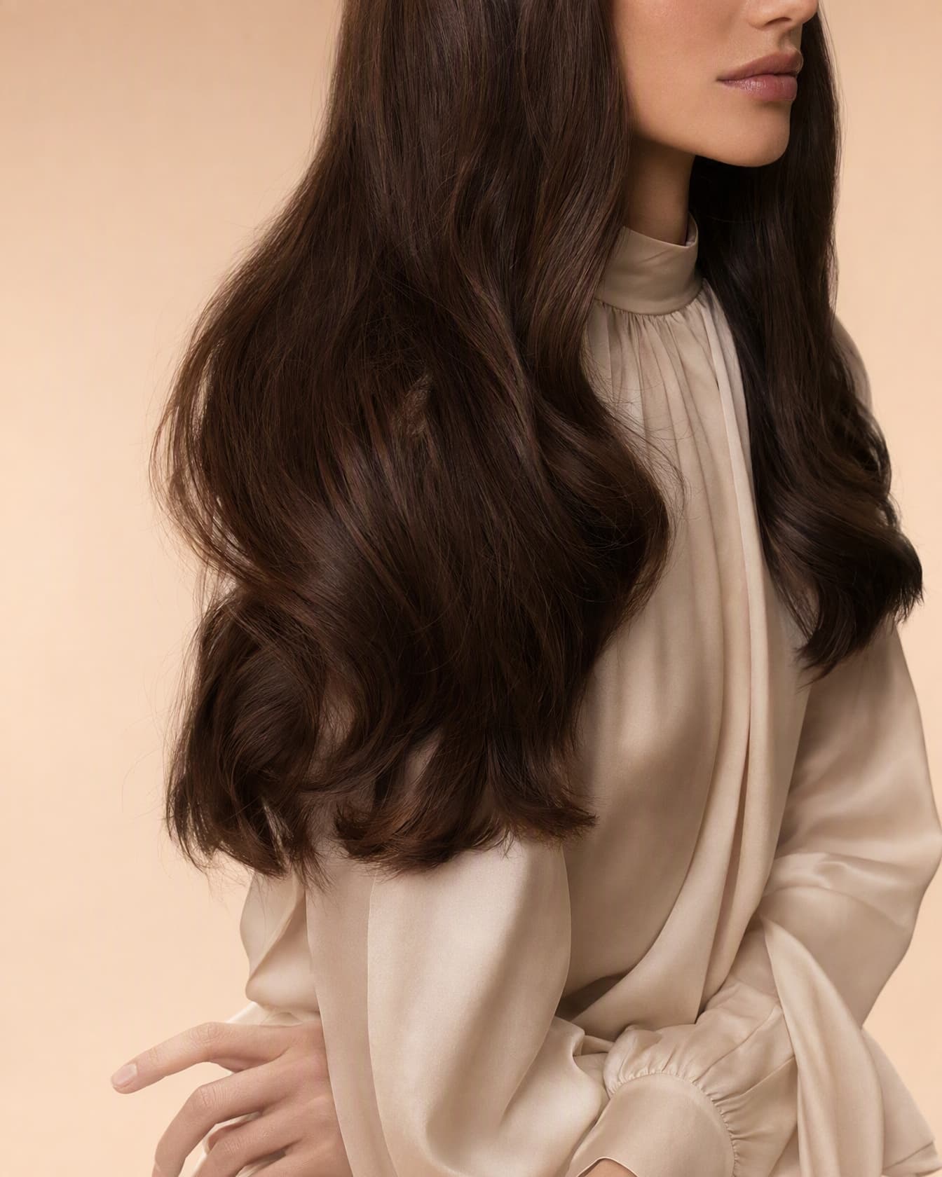 Invisible weft worn, three-quarter view, glossy lengths against a nude ground